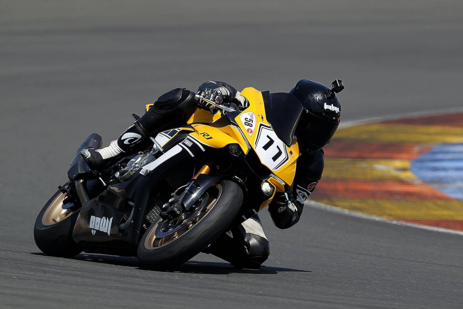 yellow and black sports motorcycle